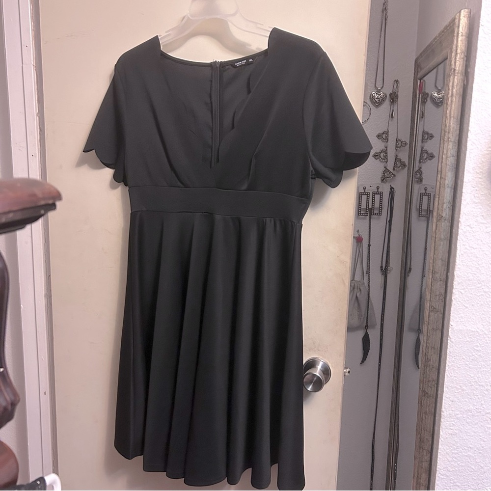 SHEIN black dress cleavage baring